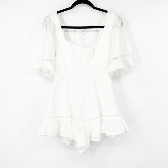 Indikah White Eyelet Ruffle Hem Romper - Picture 1 of 8